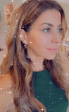 girl wearing the North Star hoop earrings